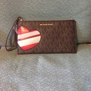 Michael Kors Large Heart Zip Clutch in Brown